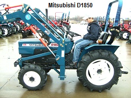 Mitsubishi D1850 tractor parked outside in a lot at a dealership